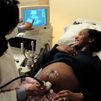 pregnant woman looking at ultrasound