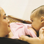 woman breastfeeding infant