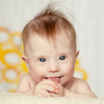 Boy with Down syndrome smiling