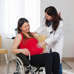 Pregnant woman in wheelchair