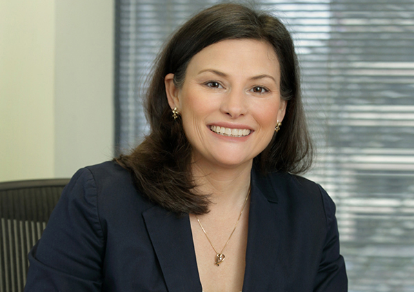 Woman sitting at desk.