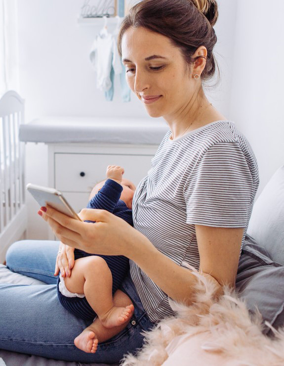 Woman breastfeeding an infant.