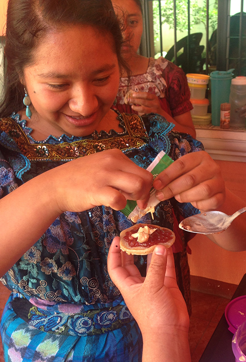 A woman in the study squeezes the supplement on to a cookie.