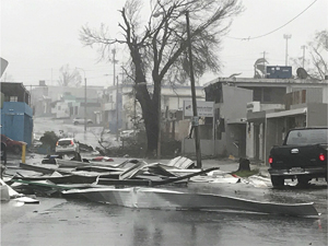 Streets in Puerto Rico blocked by debris after Hurricane Maria.