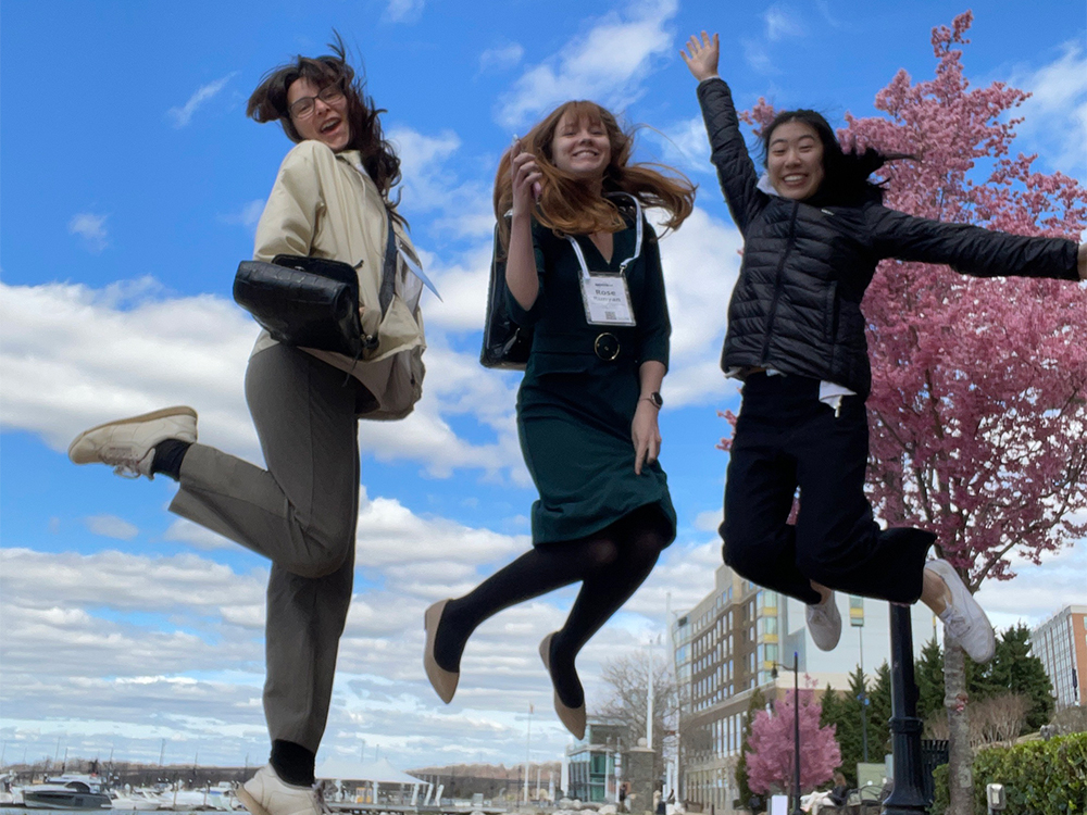 Members of the Unit on Chromosome Dynamics jumping in the air.