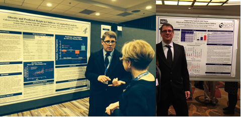 Section Member Ovidiu Galescu standing in front of poster.