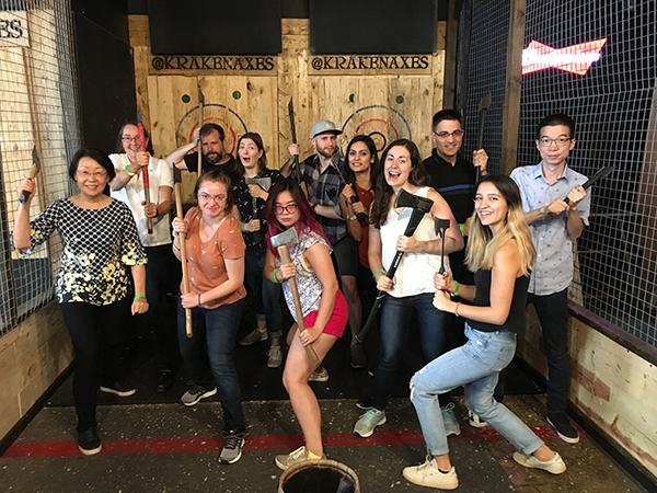 Group photo of lab at an axe-throwing outing.