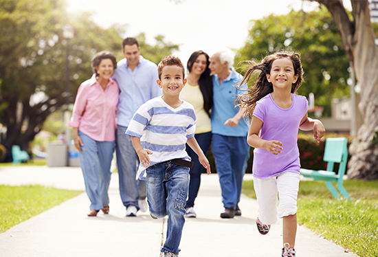 Stock image of family and running  children.